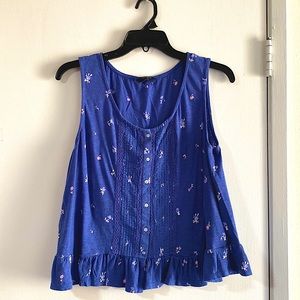 Playful floral button down tank top. Made with soft cotton, size large.